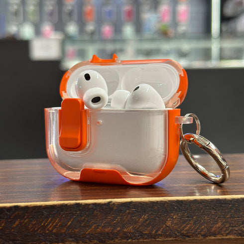 COVER PREMIUM CLEAR NARANJA CON BROCHE AIRPODS 4ta GEN / AIRPODS PRO 3